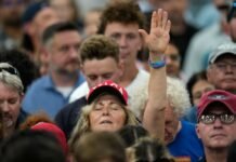Trump defends his sweeping tariffs and watches ‘America First’ drag races during Michigan stop