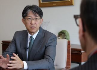 Toyota’s Koji Sato, Japan’s new car czar, wants nation’s 7 automakers to compete less, collaborate more. Industrywide parts standardization is first step