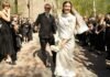 Inside a stylish Stockholm wedding with a brutalist church, bespoke fashion and vintage red shoes