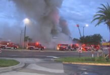 Massive fire destroys Kissimmee pawn shop, 45 firefighters battle blaze on Vine Street