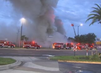 Massive fire destroys Kissimmee pawn shop, 45 firefighters battle blaze on Vine Street
