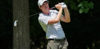 Aug 8, 2026; Greensboro, North Carolina, USA; Davis Thompson watches his tee shot on the second hole during the third round of the Wyndham Championship golf tournament. Mandatory Credit: Jim Dedmon-Imagn Images