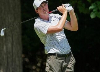Aug 8, 2026; Greensboro, North Carolina, USA; Davis Thompson watches his tee shot on the second hole during the third round of the Wyndham Championship golf tournament. Mandatory Credit: Jim Dedmon-Imagn Images