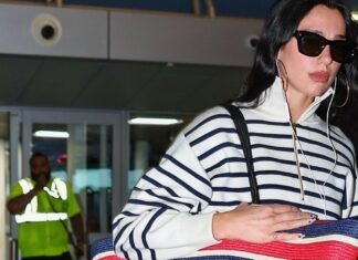 Dua Lipa Supersizes the Vacation Tote Bag—Airline Restrictions Be Damned